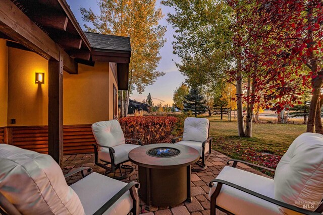 306 Otter Pond Ln, Mccall, ID 83638 - view of patio / terrace featuring an outdoor fire pit