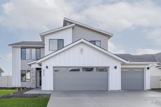 2502 W Minerva St, Kuna, ID 83634 - modern farmhouse style home with concrete driveway, a shingled roof, and an attached garage