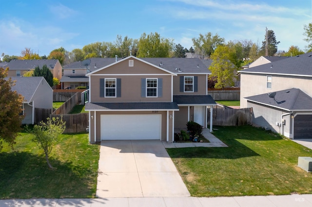 traditional-style home with concrete driveway, a residential view, fence, a front lawn, and a garage