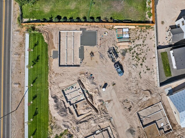 drone / aerial view featuring a mountain view