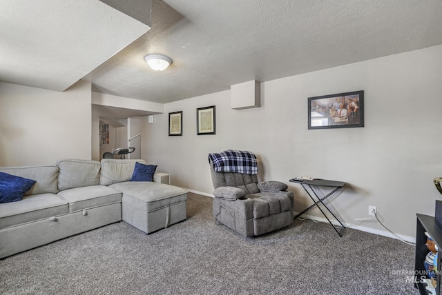 living room with a textured ceiling, carpet flooring, and baseboards