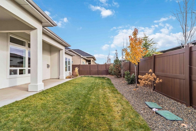 view of yard with a patio area