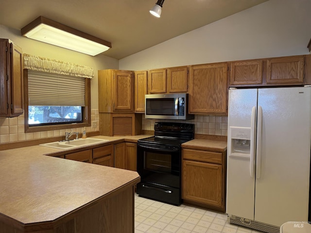 625 Trotter Dr, Twin Falls, ID 83301 - kitchen with white refrigerator with ice dispenser, stainless steel microwave, black electric range oven, a sink, and lofted ceiling