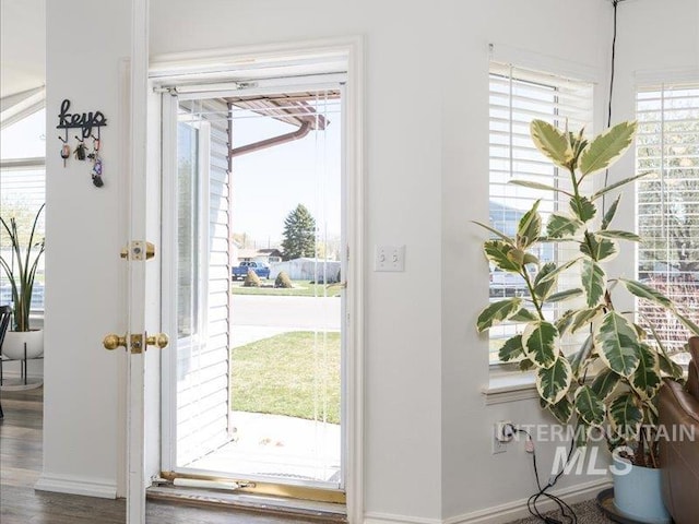 5287 Stuart Ave, Chubbuck, ID 83202 - doorway featuring wood finished floors and baseboards