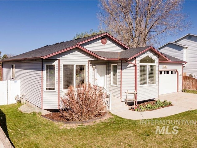 5287 Stuart Ave, Chubbuck, ID 83202 - view of front of house featuring an attached garage, driveway, and roof with shingles