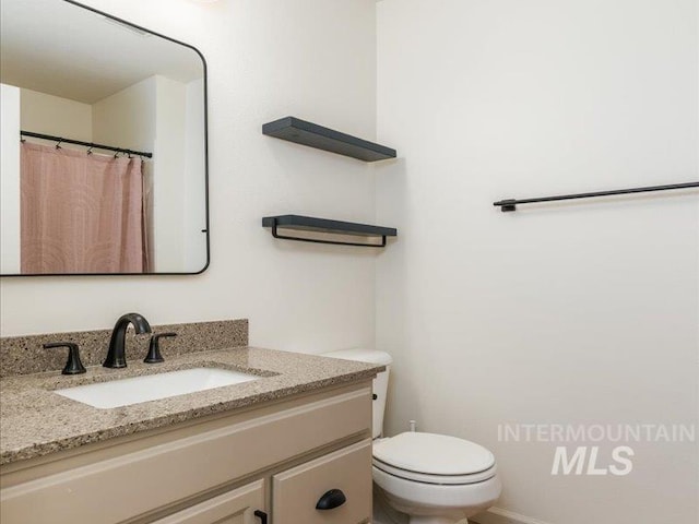 5287 Stuart Ave, Chubbuck, ID 83202 - bathroom with vanity and toilet