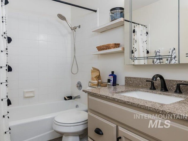 5287 Stuart Ave, Chubbuck, ID 83202 - full bathroom featuring vanity, shower / bath combo, and toilet