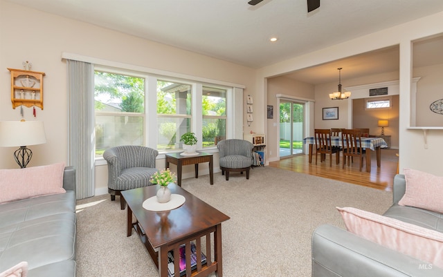 818 W Dallan Woods Way, Nampa, ID 83686 - living room featuring a chandelier, carpet, ceiling fan, and recessed lighting