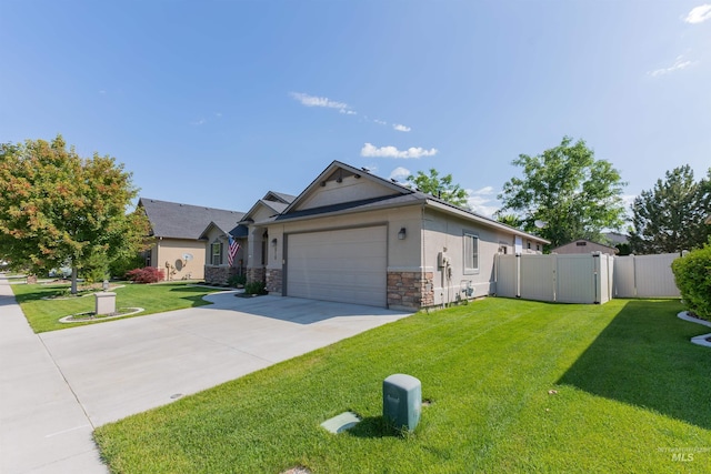 818 W Dallan Woods Way, Nampa, ID 83686 - ranch-style house with a garage, driveway, stone siding, a gate, and stucco siding