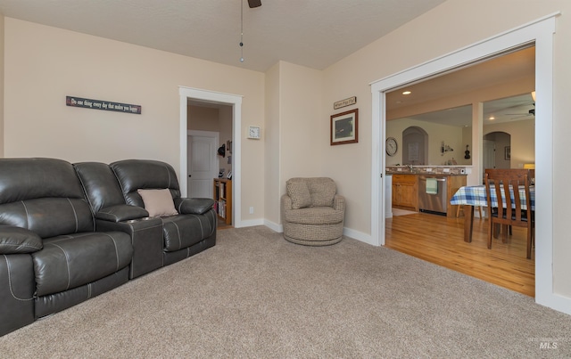 818 W Dallan Woods Way, Nampa, ID 83686 - living area featuring a ceiling fan, arched walkways, carpet, and recessed lighting
