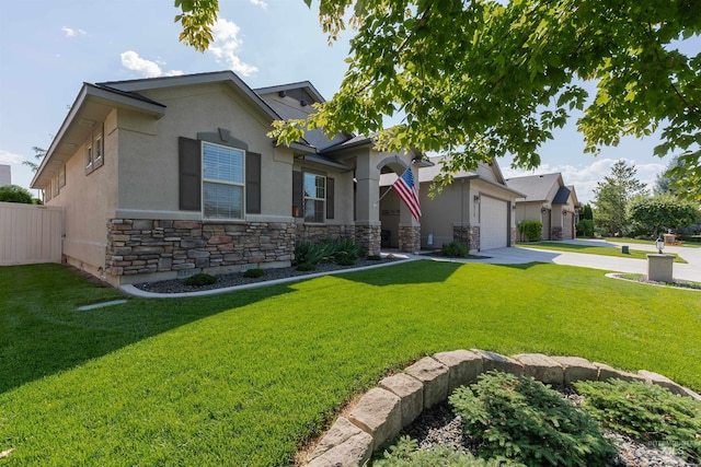 818 W Dallan Woods Way, Nampa, ID 83686 - craftsman inspired home featuring driveway, stone siding, stucco siding, and an attached garage
