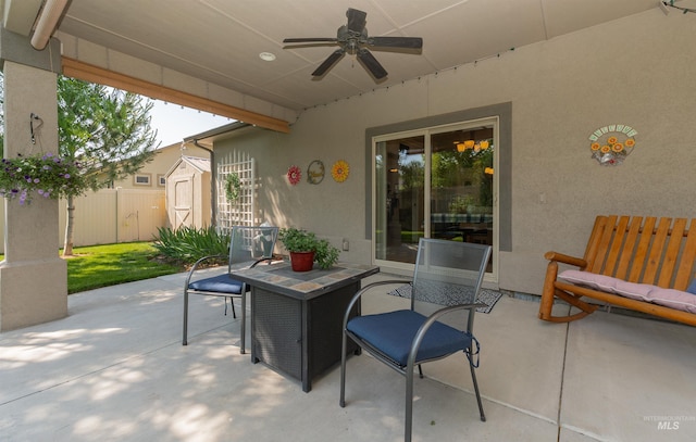 818 W Dallan Woods Way, Nampa, ID 83686 - view of patio featuring ceiling fan and a storage shed