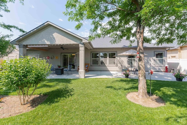 818 W Dallan Woods Way, Nampa, ID 83686 - rear view of house featuring stucco siding, ceiling fan, and a patio area