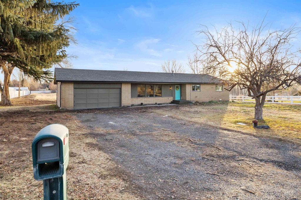 ranch-style home with a garage