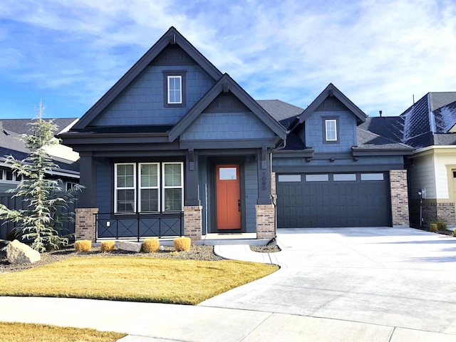 craftsman house with a garage