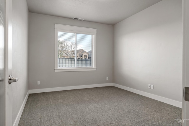 empty room featuring carpet