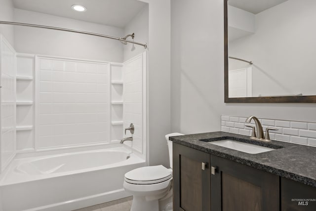 full bathroom with tasteful backsplash, vanity, tub / shower combination, and toilet