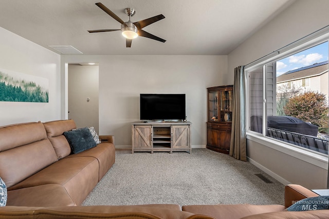 living room featuring ceiling fan and carpet flooring