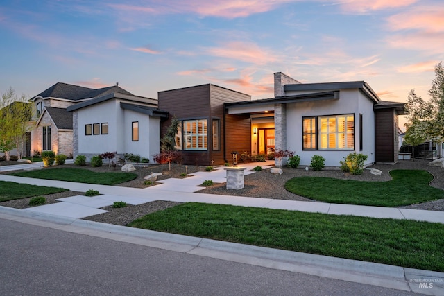 1771 S Riparian Way, Eagle, ID 83616 - view of front of property featuring a yard, stucco siding, and a chimney
