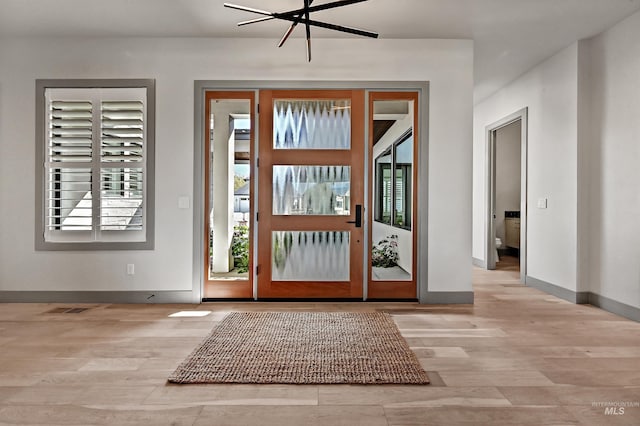 1771 S Riparian Way, Eagle, ID 83616 - entrance foyer featuring light wood finished floors and baseboards