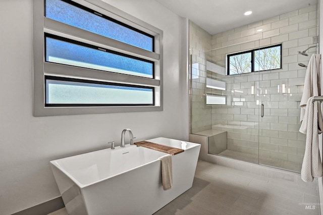 1771 S Riparian Way, Eagle, ID 83616 - bathroom featuring plenty of natural light, a stall shower, a soaking tub, and recessed lighting