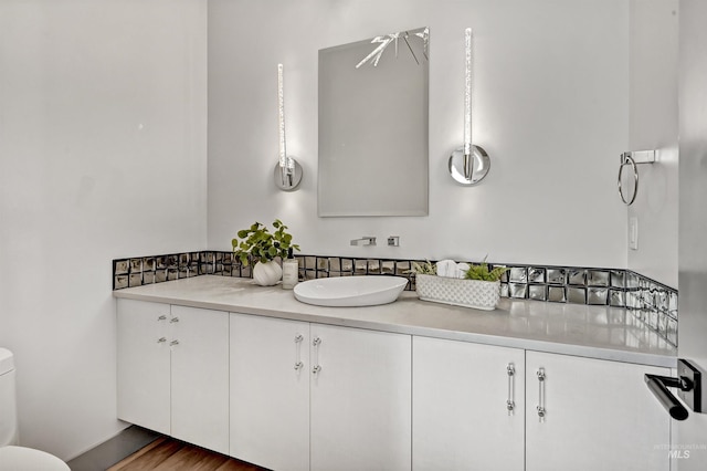 1771 S Riparian Way, Eagle, ID 83616 - bathroom with toilet, vanity, and wood finished floors