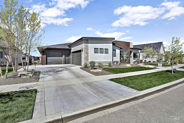 1771 S Riparian Way, Eagle, ID 83616 - contemporary home with an attached garage, stone siding, concrete driveway, a front lawn, and stucco siding