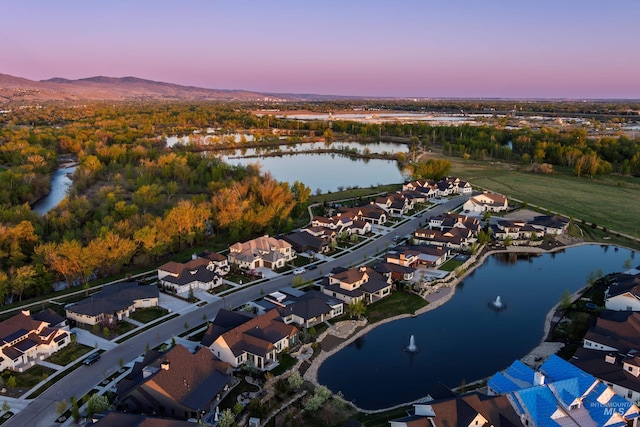 1771 S Riparian Way, Eagle, ID 83616 - aerial view of property and surrounding area with a water and mountain view and nearby suburban area