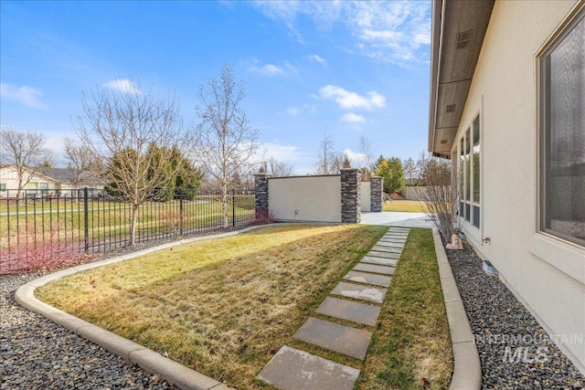 view of yard with fence