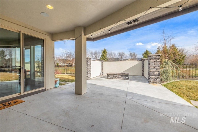 view of patio with a fenced backyard