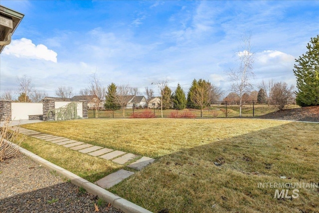 view of yard with fence