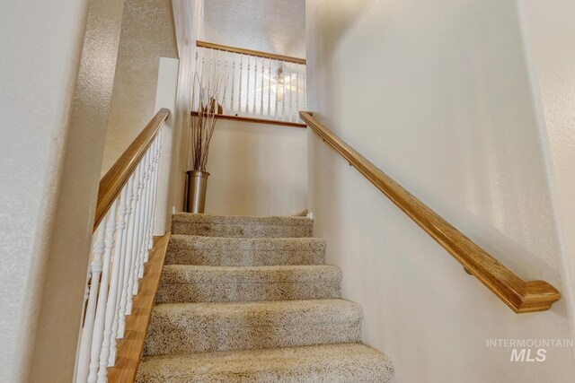 1587 N Firebrick Dr, Kuna, ID 83634 - stairs with wood finished floors