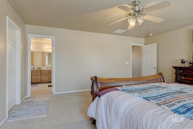 1587 N Firebrick Dr, Kuna, ID 83634 - bedroom with light carpet, baseboards, a ceiling fan, ensuite bath, and a textured ceiling