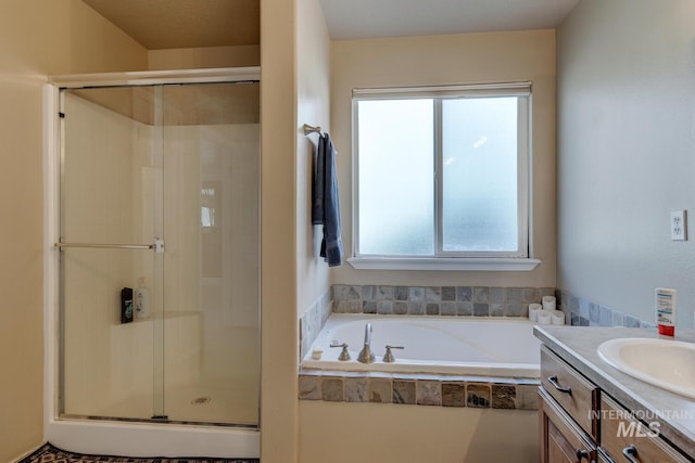 1587 N Firebrick Dr, Kuna, ID 83634 - full bathroom with a stall shower, a garden tub, and vanity