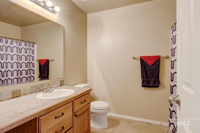 1587 N Firebrick Dr, Kuna, ID 83634 - full bath featuring baseboards, vanity, and toilet