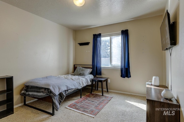1587 N Firebrick Dr, Kuna, ID 83634 - carpeted bedroom featuring a textured ceiling and baseboards