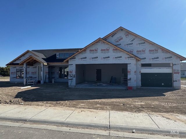 1628 Tule Dr, Twin Falls, ID 83301 - property under construction with a garage and dirt driveway