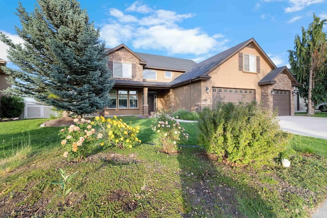 3508 E Alexis Ct, Nampa, ID 83686 - view of front of house with stone siding, stucco siding, and concrete driveway