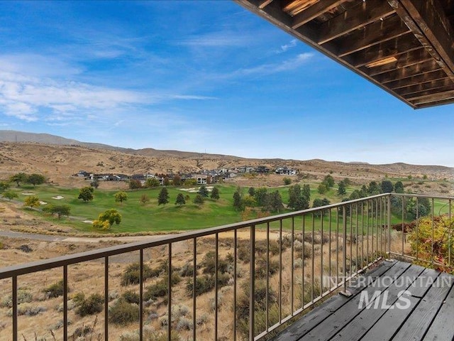 balcony featuring a mountain view