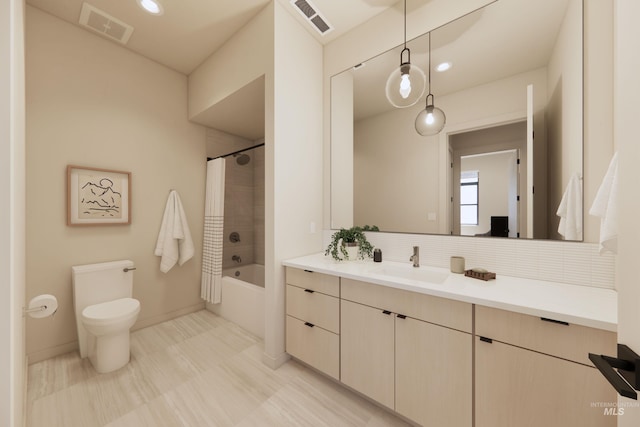 full bathroom with toilet, shower / bath combo with shower curtain, tasteful backsplash, and vanity