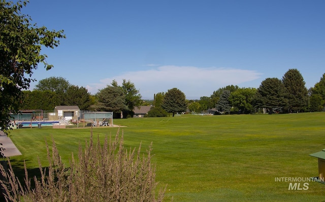 2722 Pascoe Ln, Nampa, ID 83686 - view of green lawn featuring an outbuilding