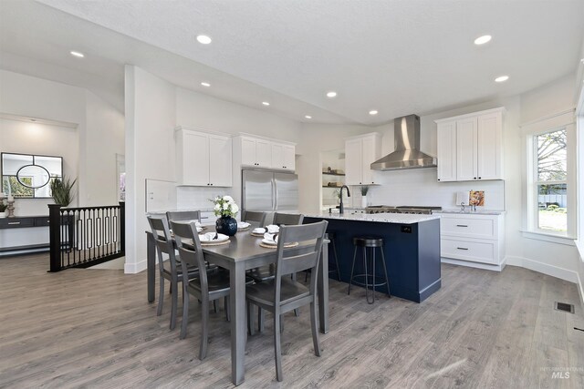 1910 W Campo Ln, Eagle, ID 83616 - dining room with recessed lighting, light wood finished floors, and baseboards
