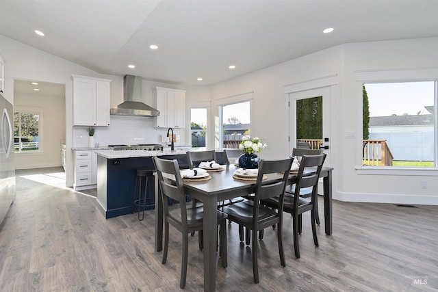 1910 W Campo Ln, Eagle, ID 83616 - dining space with wood finished floors, recessed lighting, healthy amount of natural light, and baseboards
