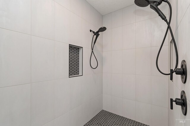 1910 W Campo Ln, Eagle, ID 83616 - full bathroom with a tile shower