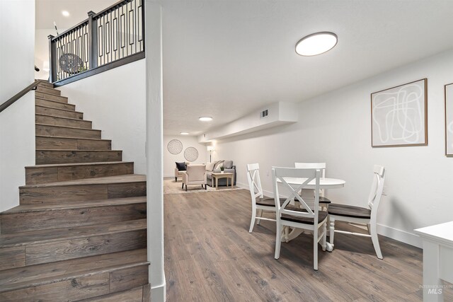 1910 W Campo Ln, Eagle, ID 83616 - dining space with stairway, wood finished floors, baseboards, and recessed lighting