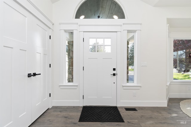 1910 W Campo Ln, Eagle, ID 83616 - foyer entrance featuring plenty of natural light, baseboards, and dark wood-style floors