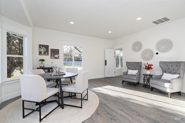 1910 W Campo Ln, Eagle, ID 83616 - dining space with baseboards, wood finished floors, and recessed lighting
