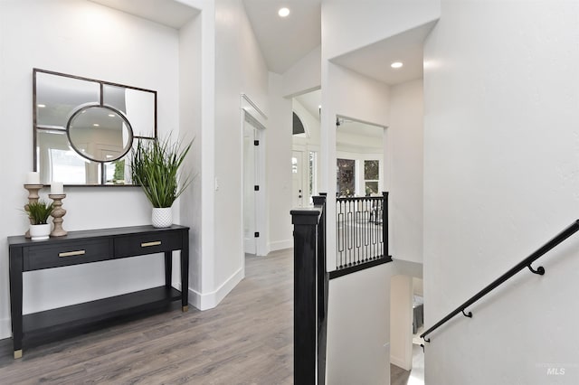 1910 W Campo Ln, Eagle, ID 83616 - staircase featuring wood finished floors, baseboards, and recessed lighting