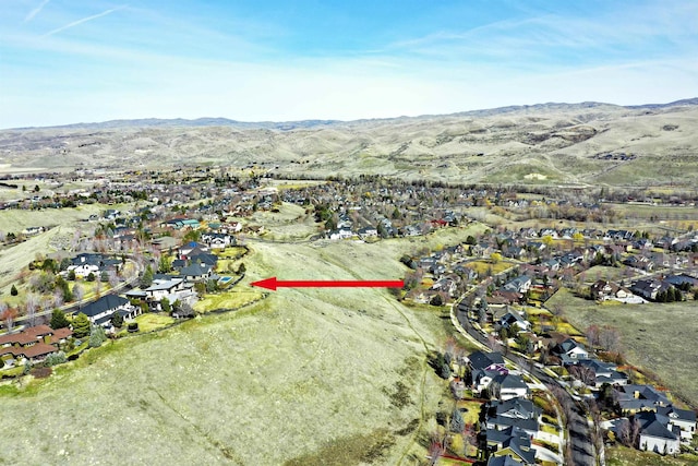 aerial view with a mountain view and a residential view