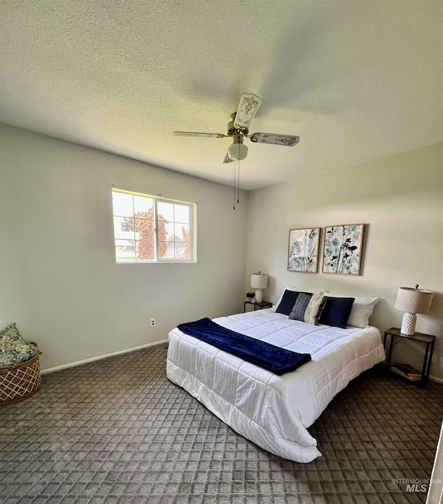 2025 10th Ave, Clarkston, WA 99403 - bedroom with a textured ceiling, baseboards, ceiling fan, and carpet floors